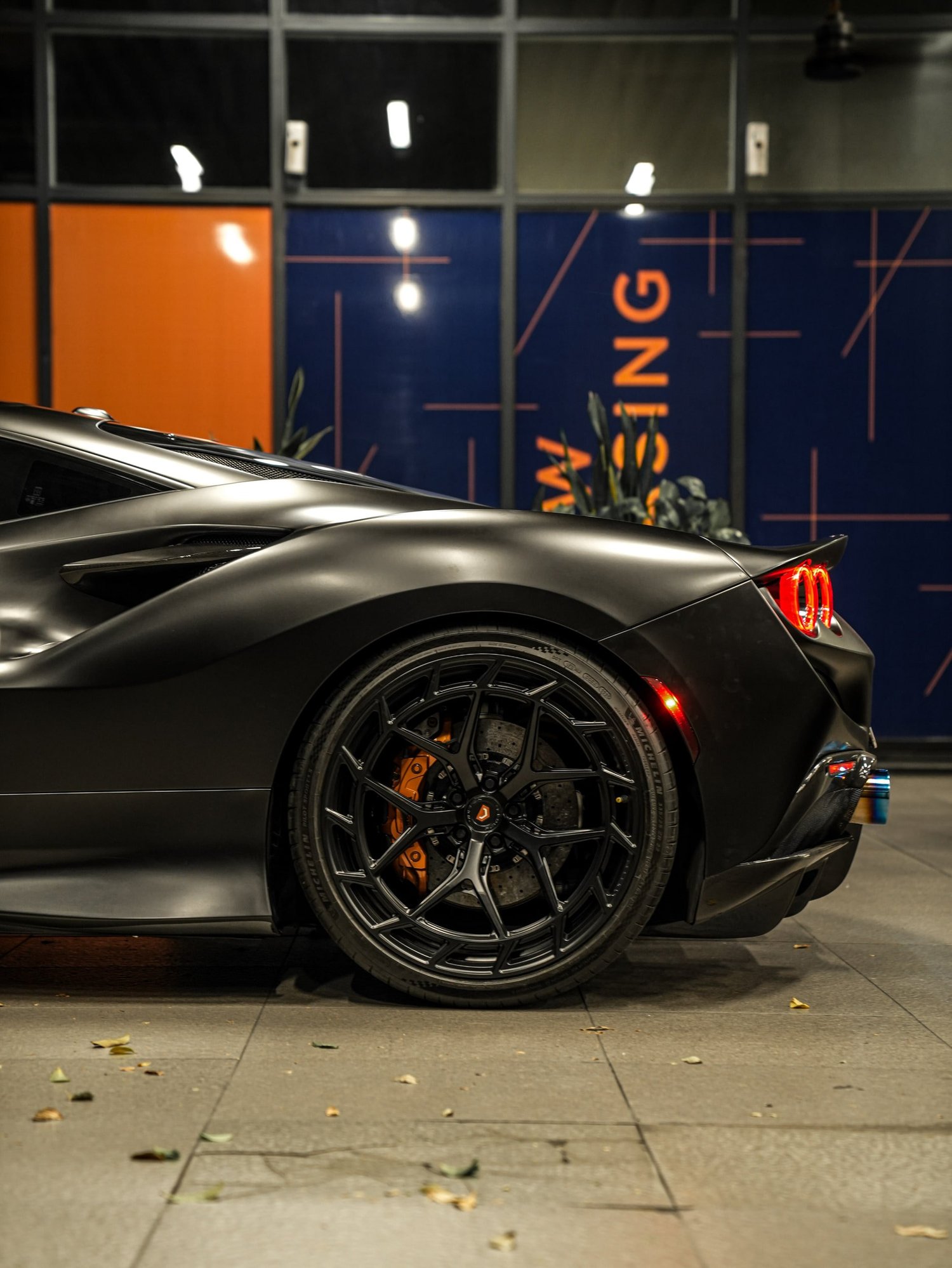 Ferrari F8 3M Satin Black after Vinyl Wrap, rear-quarter and wheel view