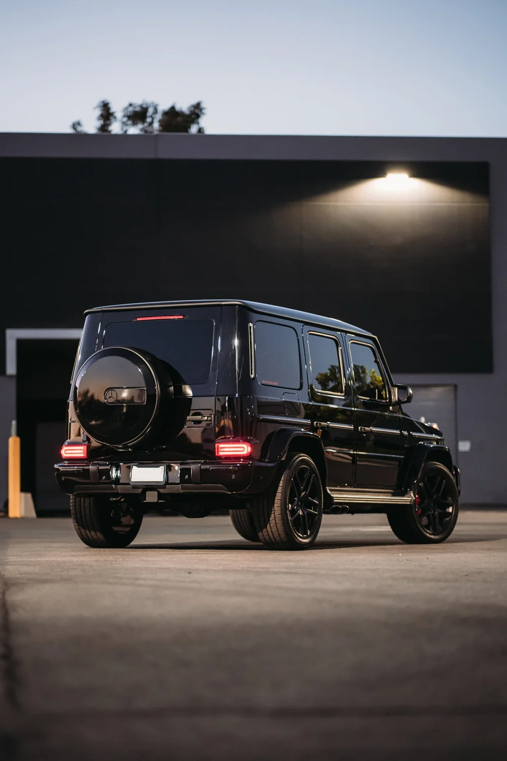 Mercedes-AMG G 63, portrait rear three-quarter view with the spare-wheel cover