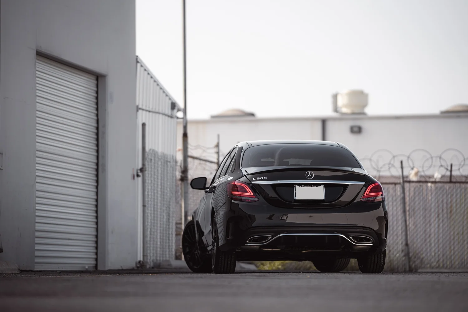 Mercedes-Benz C 300 after Window Tint, Ceramic Coating and Wheel Powder Coating, direct rear view