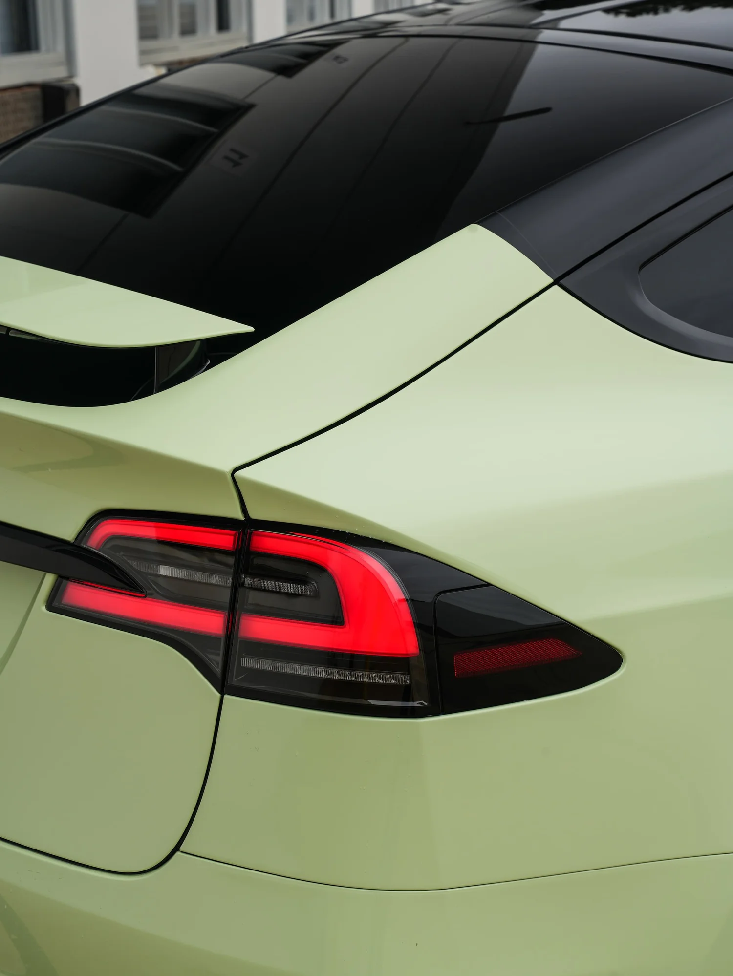 Tesla Model X Avocado Green after Vinyl Wrap, rear body and taillight view