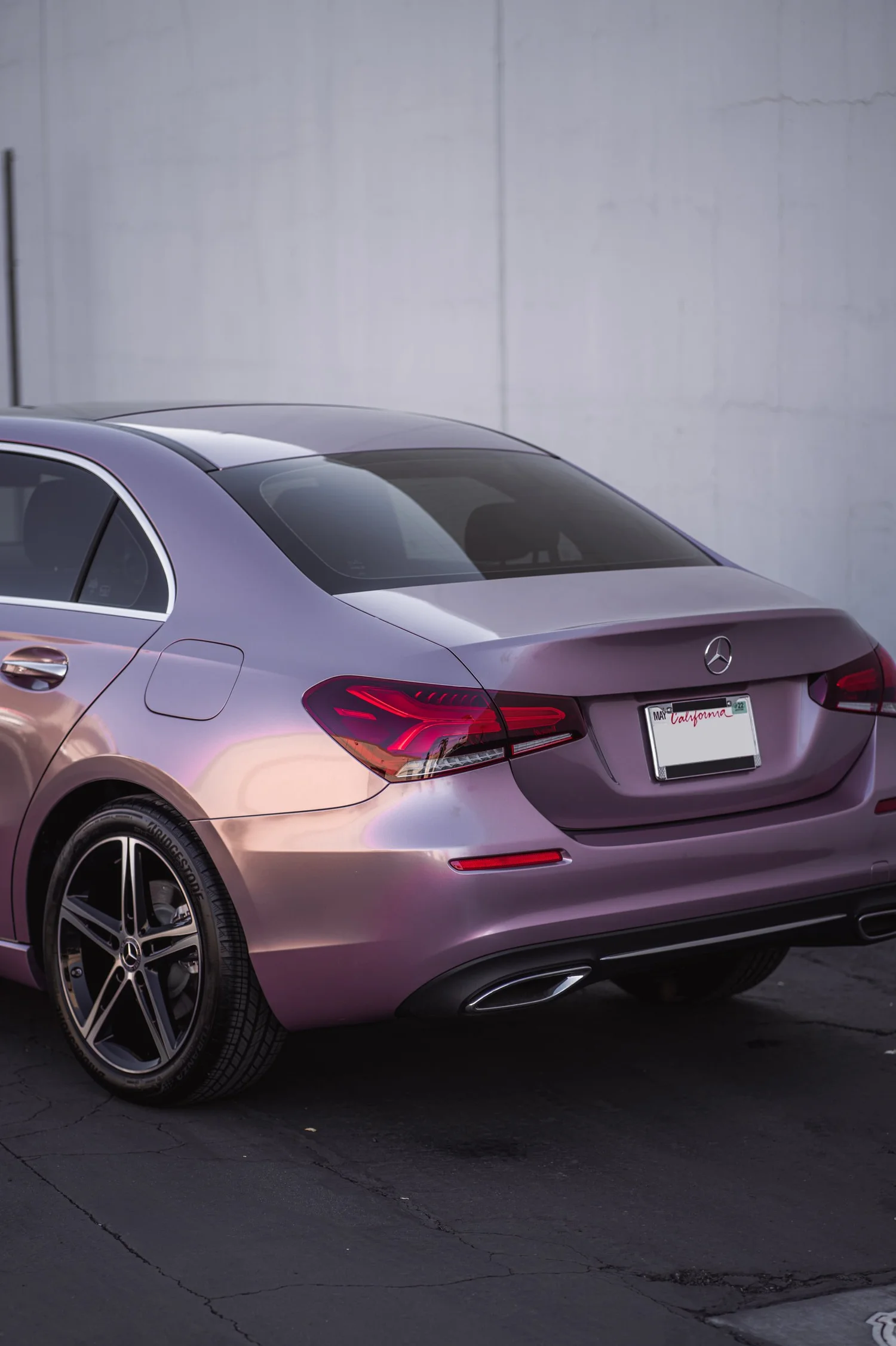 Mercedes-Benz A 220 Frozen Berry after Vinyl Wrap, rear-right three-quarter view