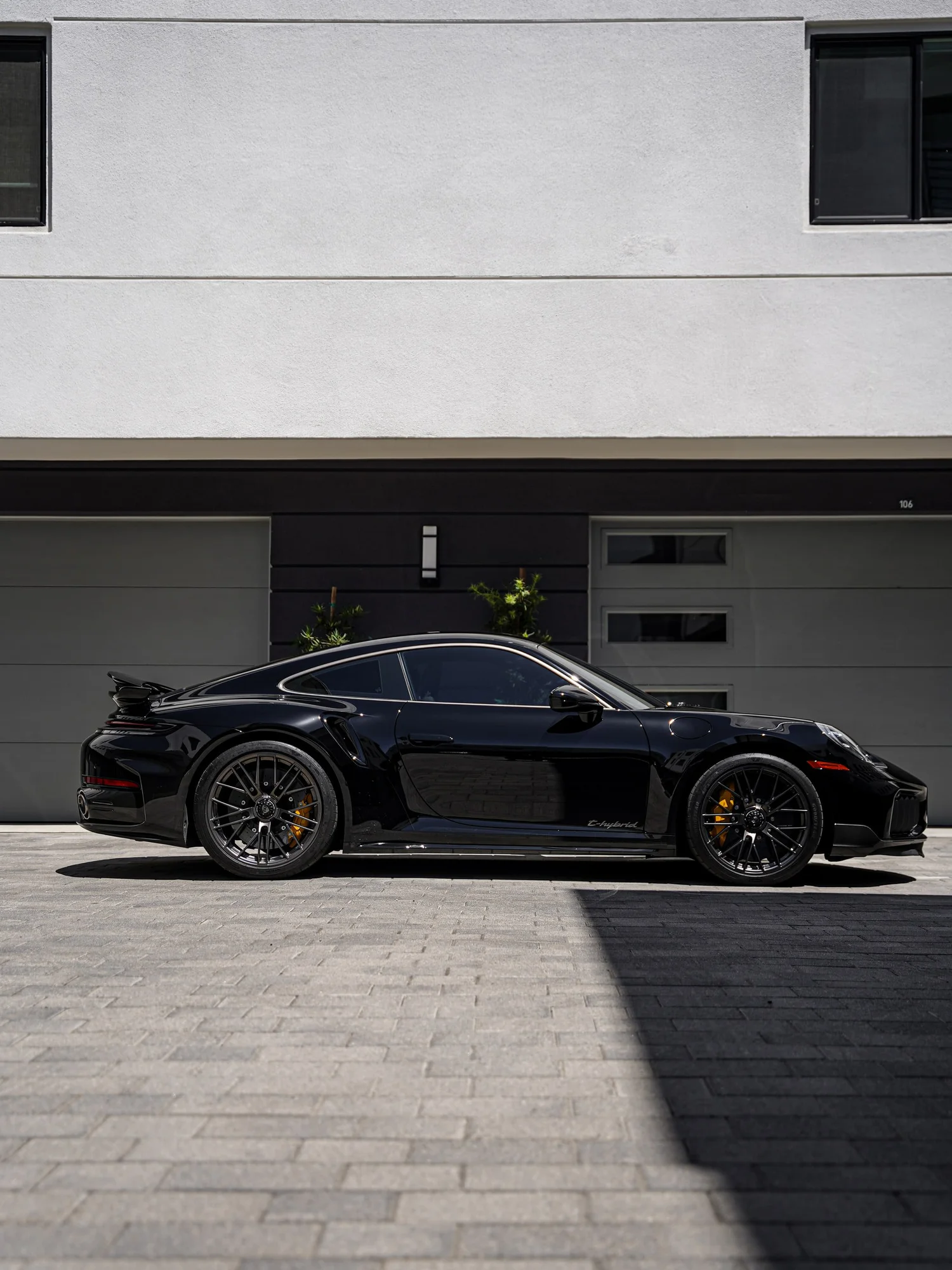 Porsche 911 Turbo S after Paint Protection Film (PPF), Window Tint and Ceramic Coating, rear-left three-quarter view