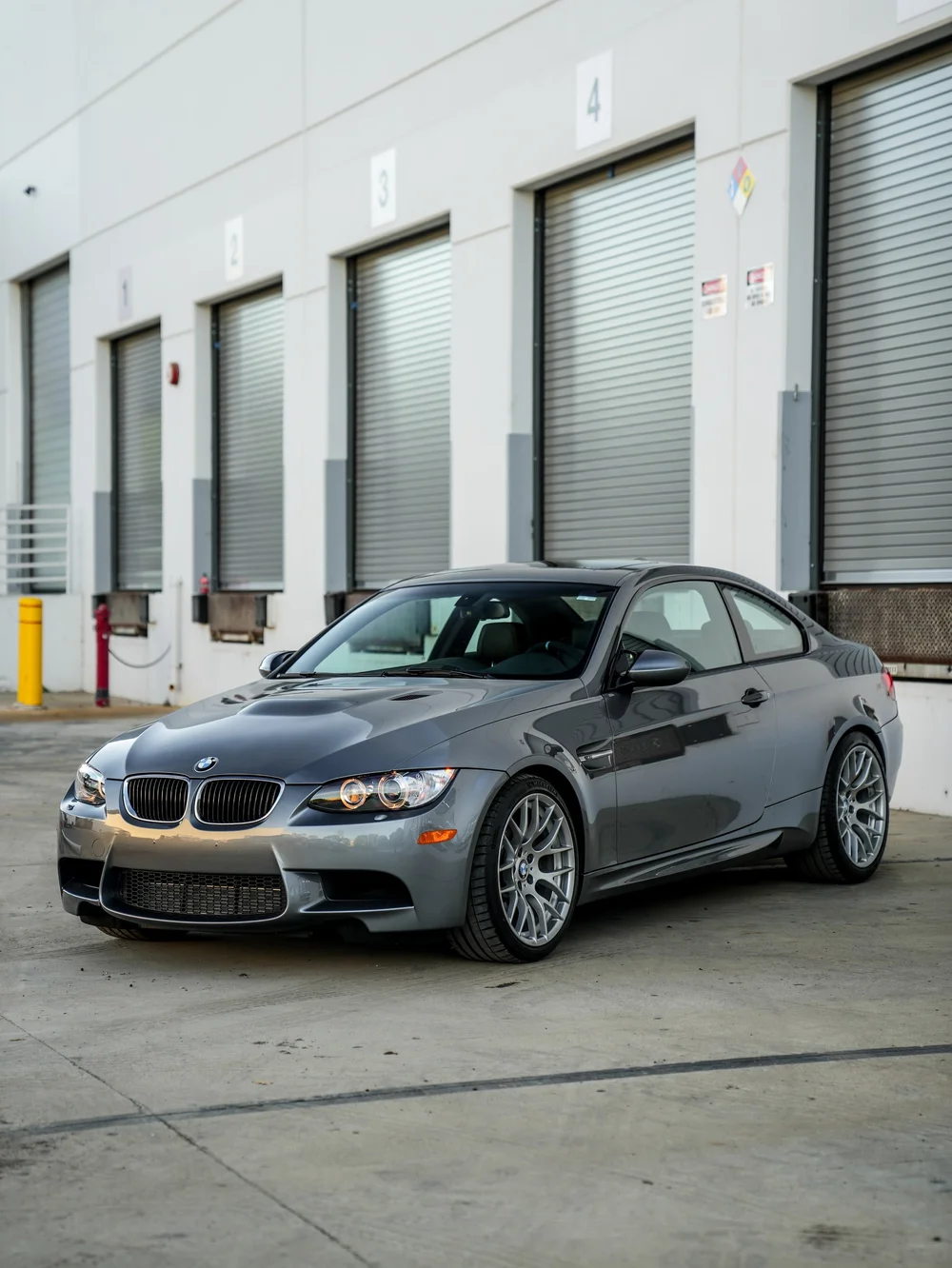 BMW E92 M3 paint protection film project, opposite front three-quarter whole-car view