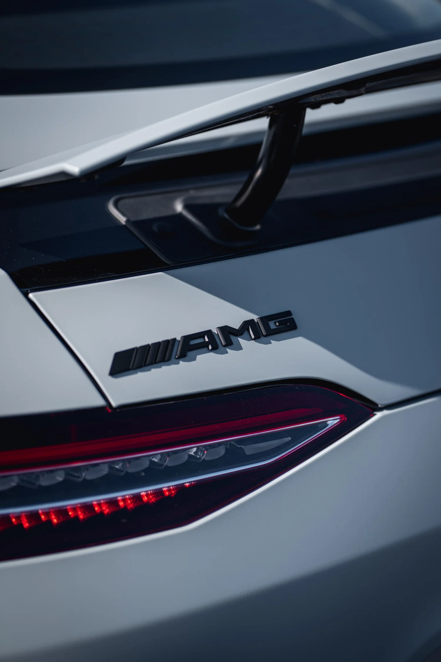 Mercedes-AMG GT 53 Avery Battleship Grey after Vinyl Wrap, rear bumper and taillight detail
