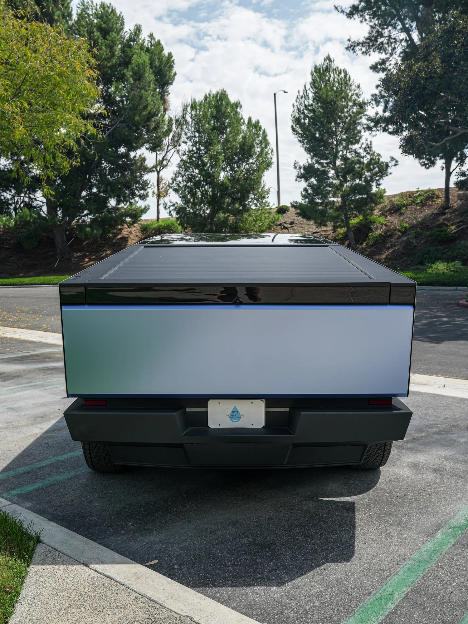 Tesla Cybertruck Matte Blue after Vinyl Wrap, close rear view