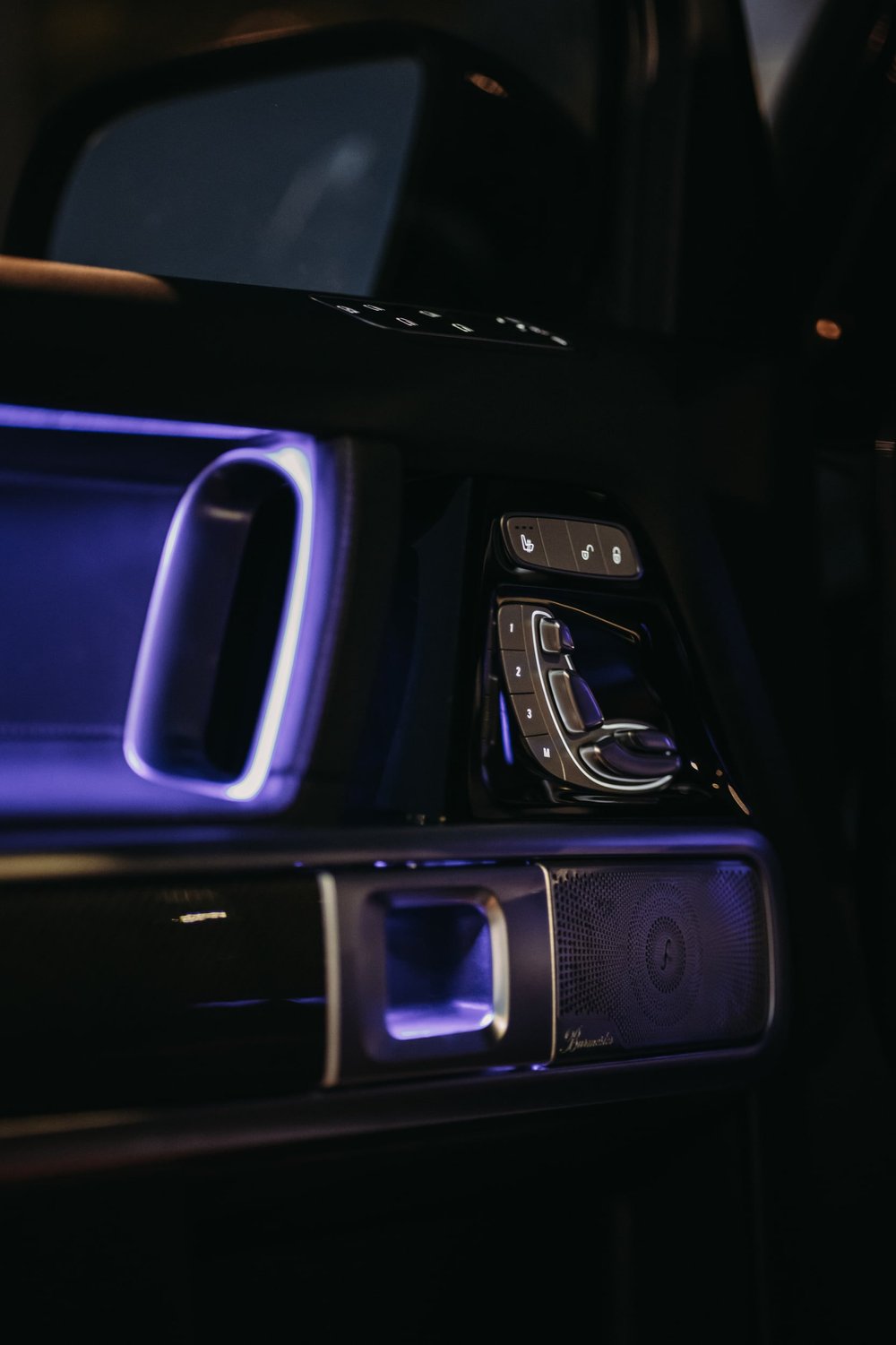 Mercedes-AMG G 63, interior door panel with purple ambient lighting