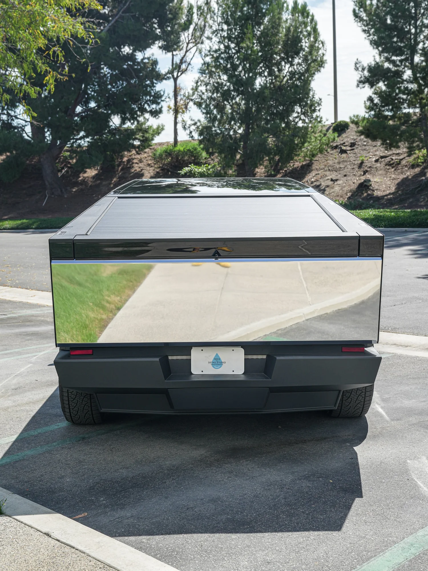 Tesla Cybertruck Chrome after Vinyl Wrap, close rear view