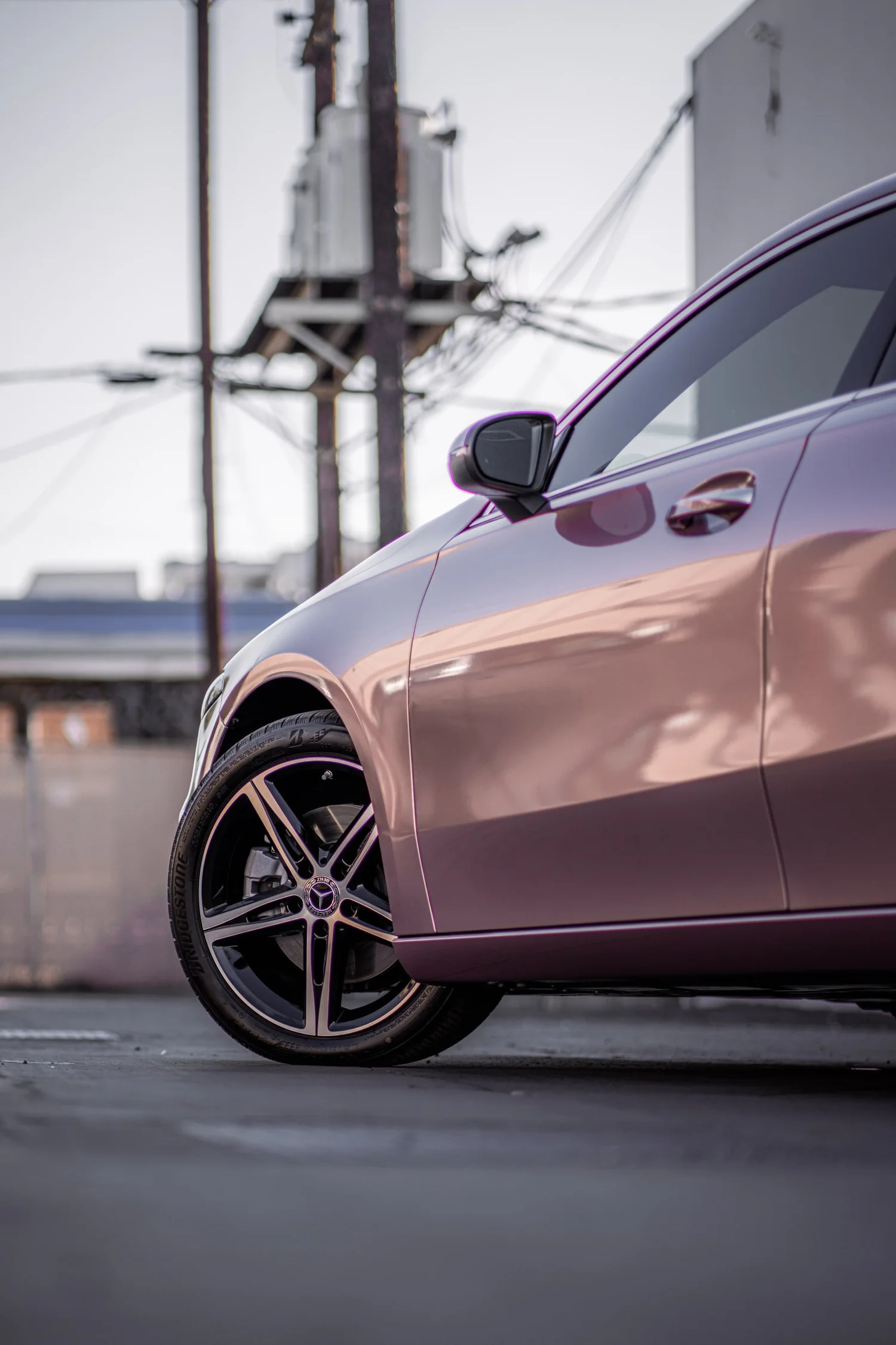 Mercedes-Benz A 220 Frozen Berry after Vinyl Wrap, front-fender and wheel view