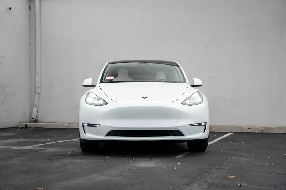 White Tesla Model Y Full-Body STEK DYNOmatte PPF & XPEL XR Plus Window Tint — Full-Body STEK DYNOmatte PPF · XPEL XR Plus Window Tint