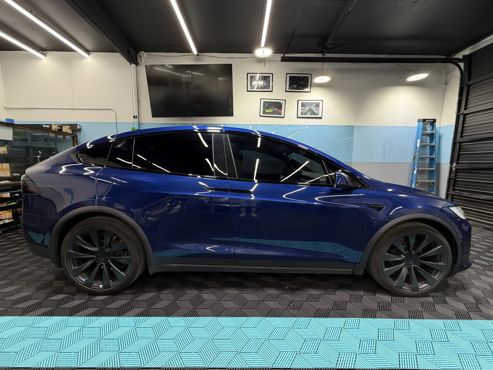 2025 Tesla Model X — side view inside the studio