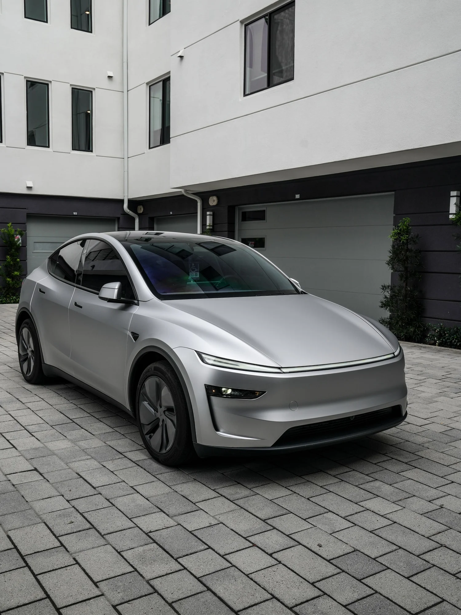 Tesla Model Y TPU Matte Silver Colored PPF after Paint Protection Film (PPF), front-left three-quarter view