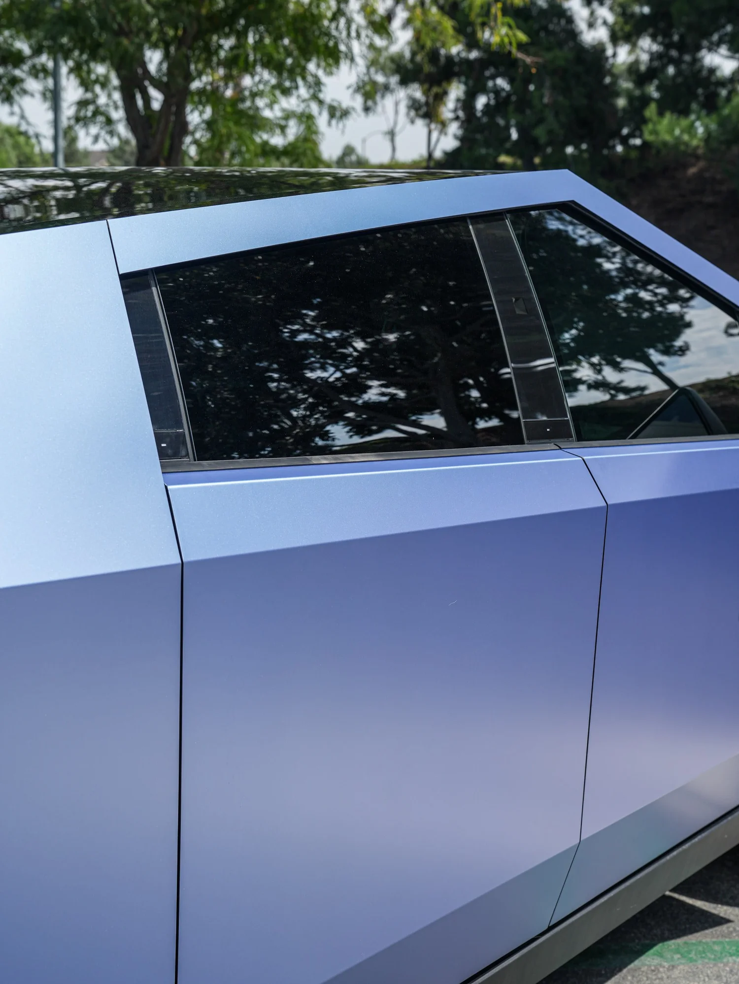 Tesla Cybertruck Matte Blue after Vinyl Wrap, roof and glass detail