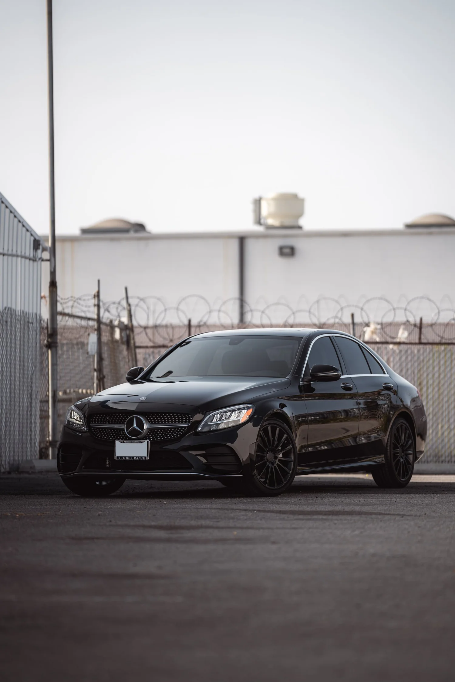 Mercedes-Benz C 300 after Window Tint, Ceramic Coating and Wheel Powder Coating, front-right three-quarter view