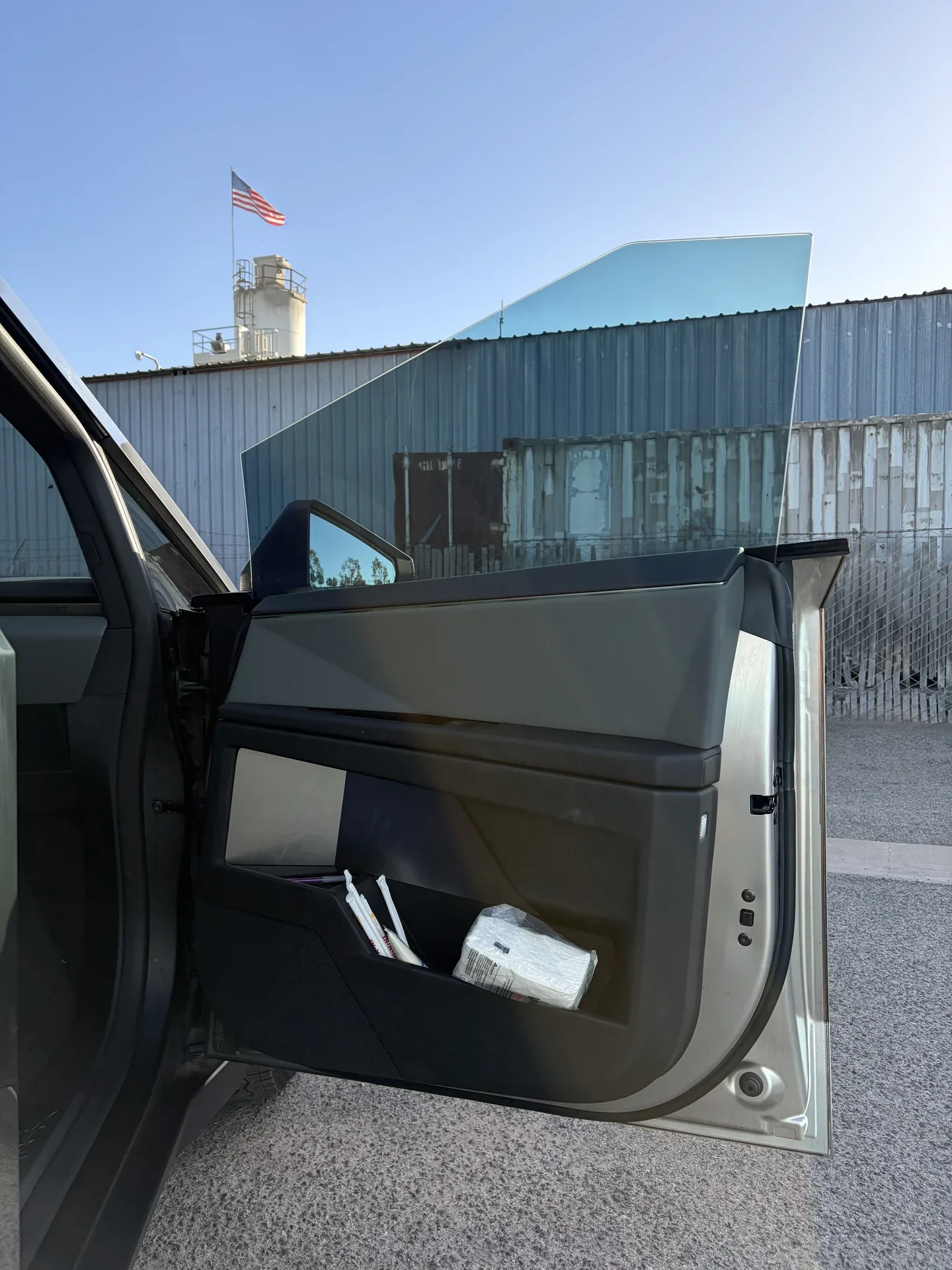 2026 Tesla Cybertruck Cyberbeast — open front door and side window viewed from outside