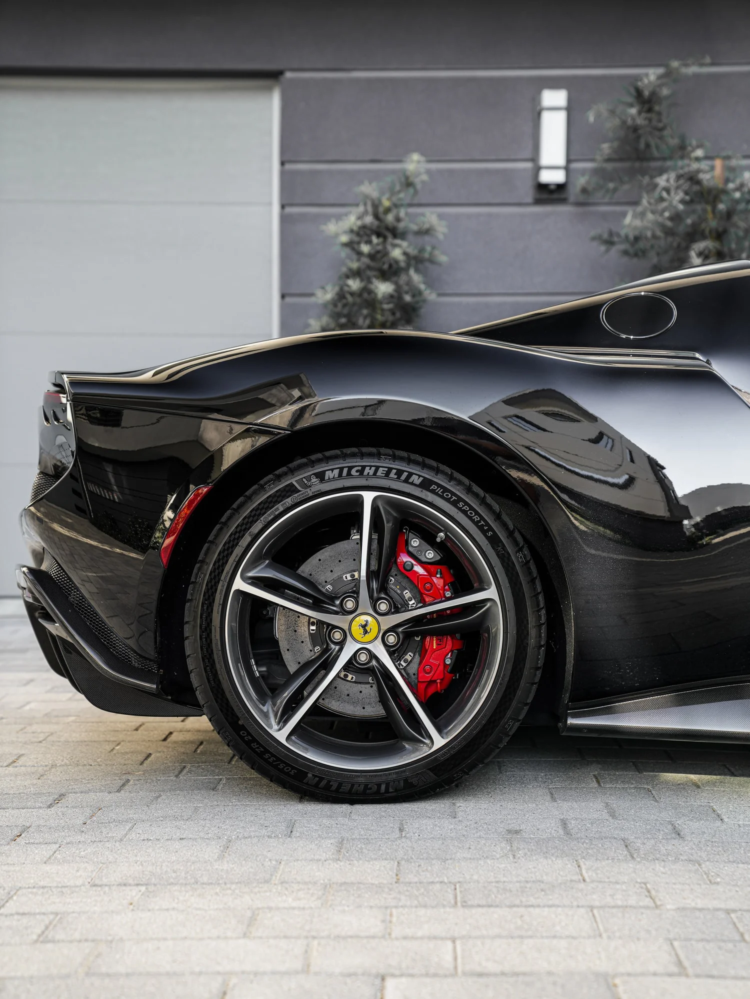 Ferrari 296 after Paint Protection Film (PPF) and Window Tint, rear-quarter and wheel view