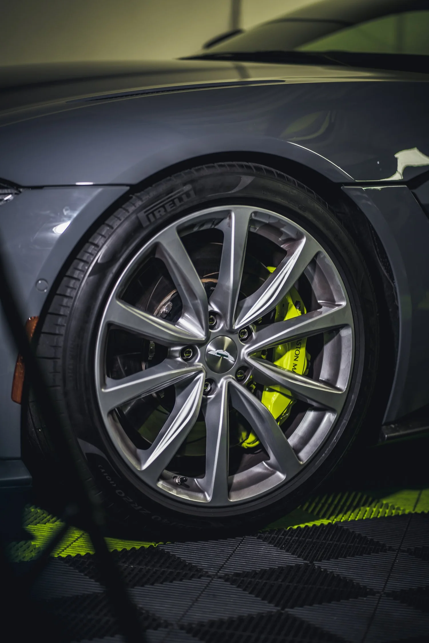 Aston Martin Vantage Acid Green after Brake Caliper Repaint, front-fender and wheel view