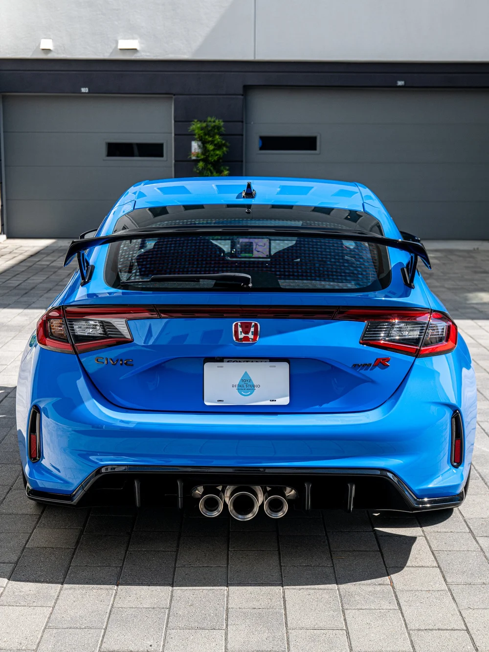 Straight rear view of a 2026 Honda Civic Type R FL5 with factory rear wing