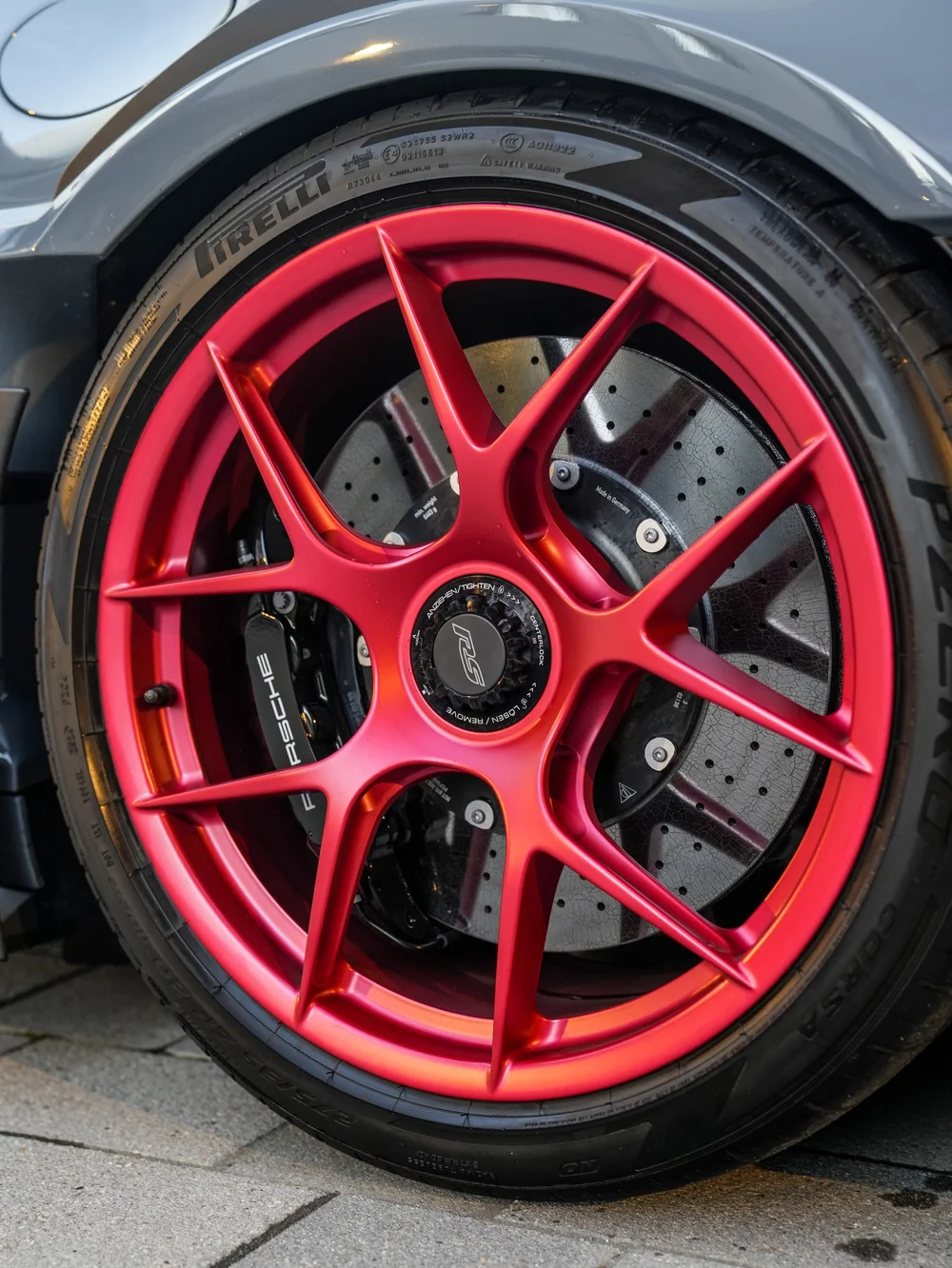 Red wheel and brake disc close view — Porsche 911 GT3 RS detailing project