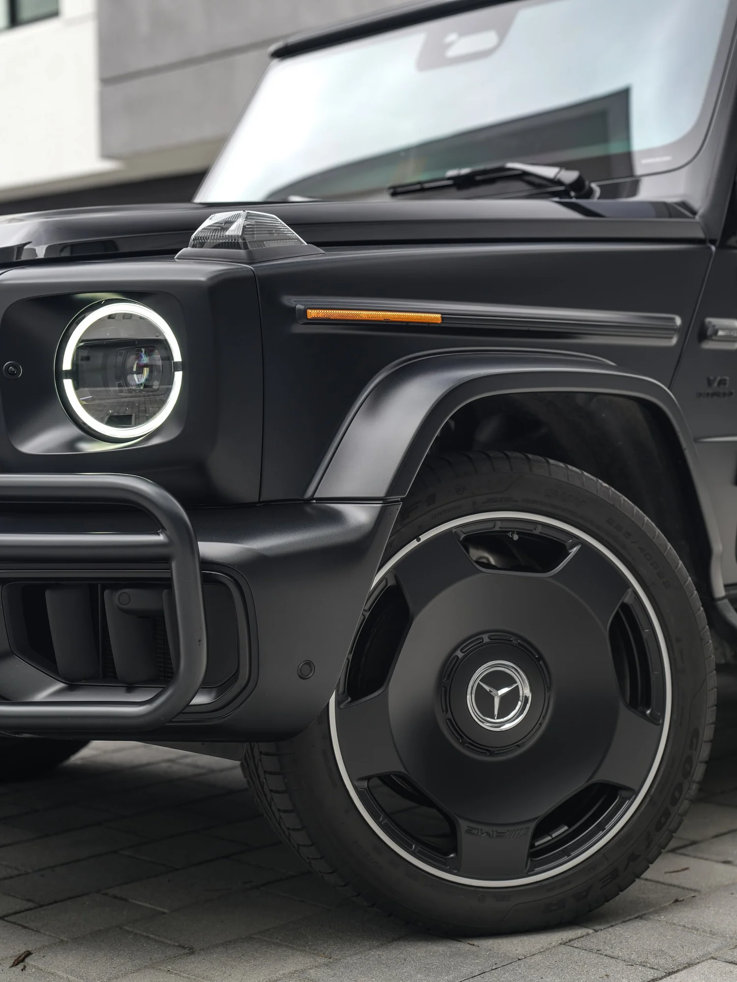 Mercedes-AMG G 63 Two-Tone Black after Paint Protection Film (PPF) and Window Tint, front wheel and body view
