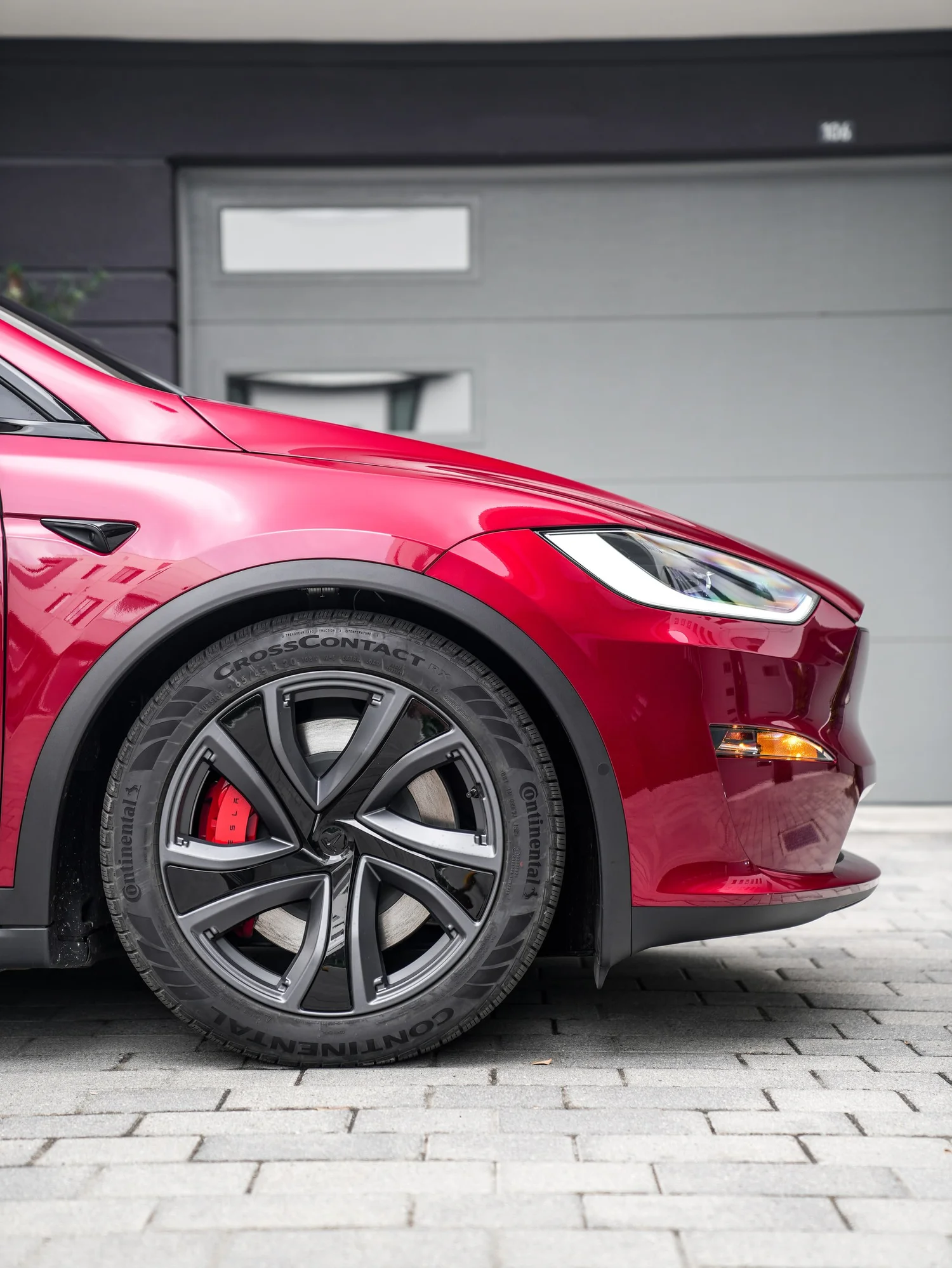 Tesla Model X after Paint Protection Film (PPF) and Window Tint, front wheel and body view