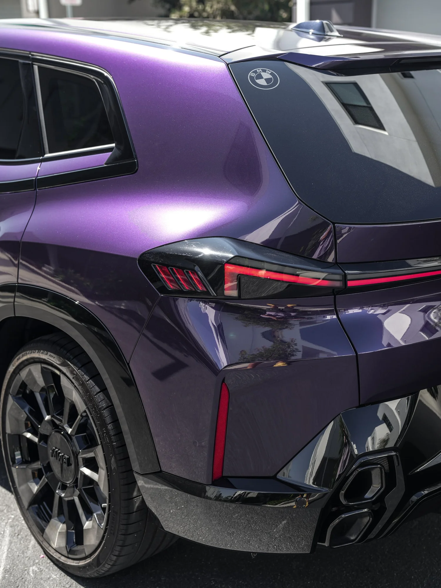 BMW XM Venetian Mauve Colored PPF after Paint Protection Film (PPF), rear body and taillight view