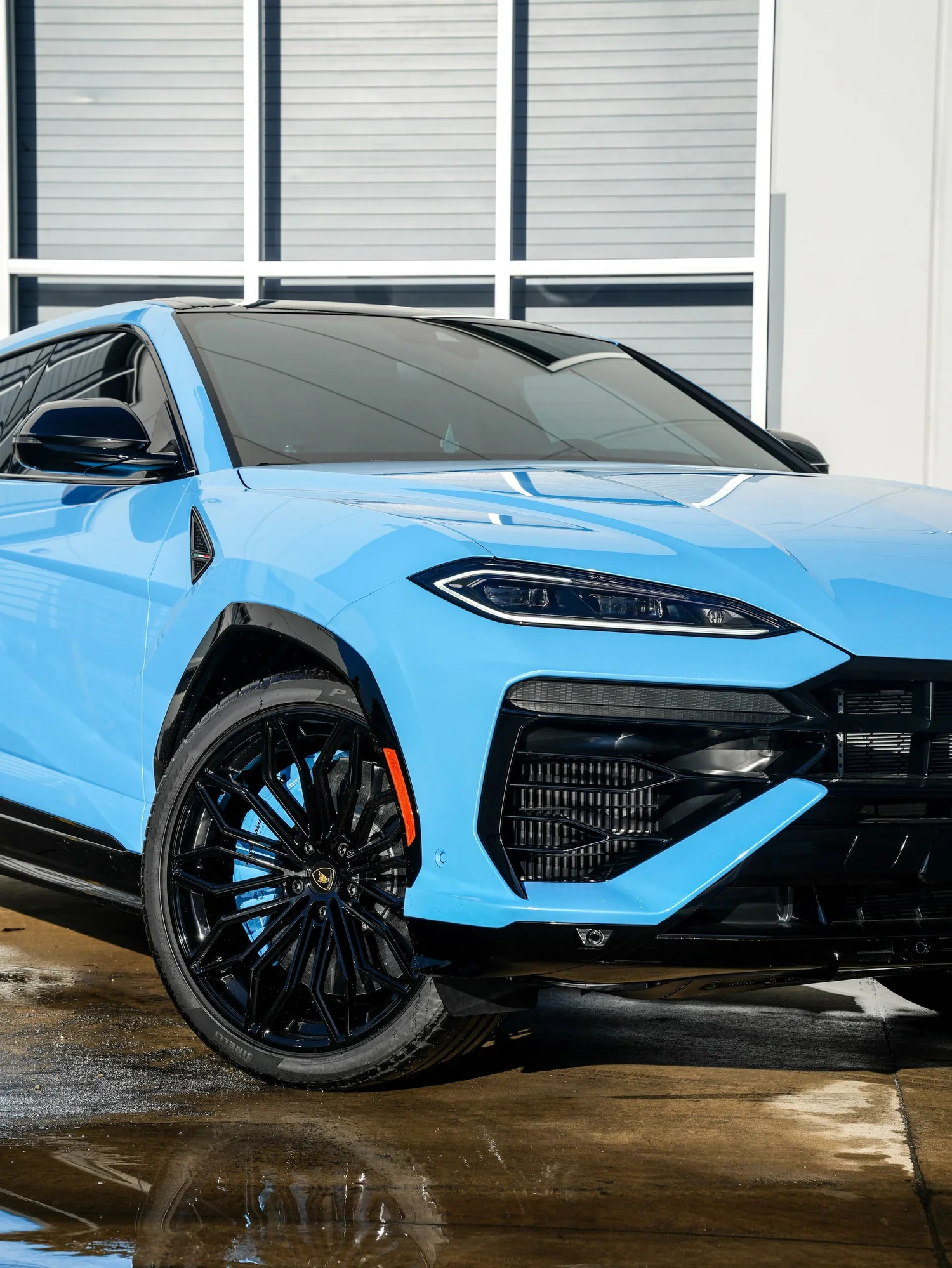Lamborghini Urus SE after Paint Protection Film (PPF), Window Tint and Ceramic Coating, front-right three-quarter view
