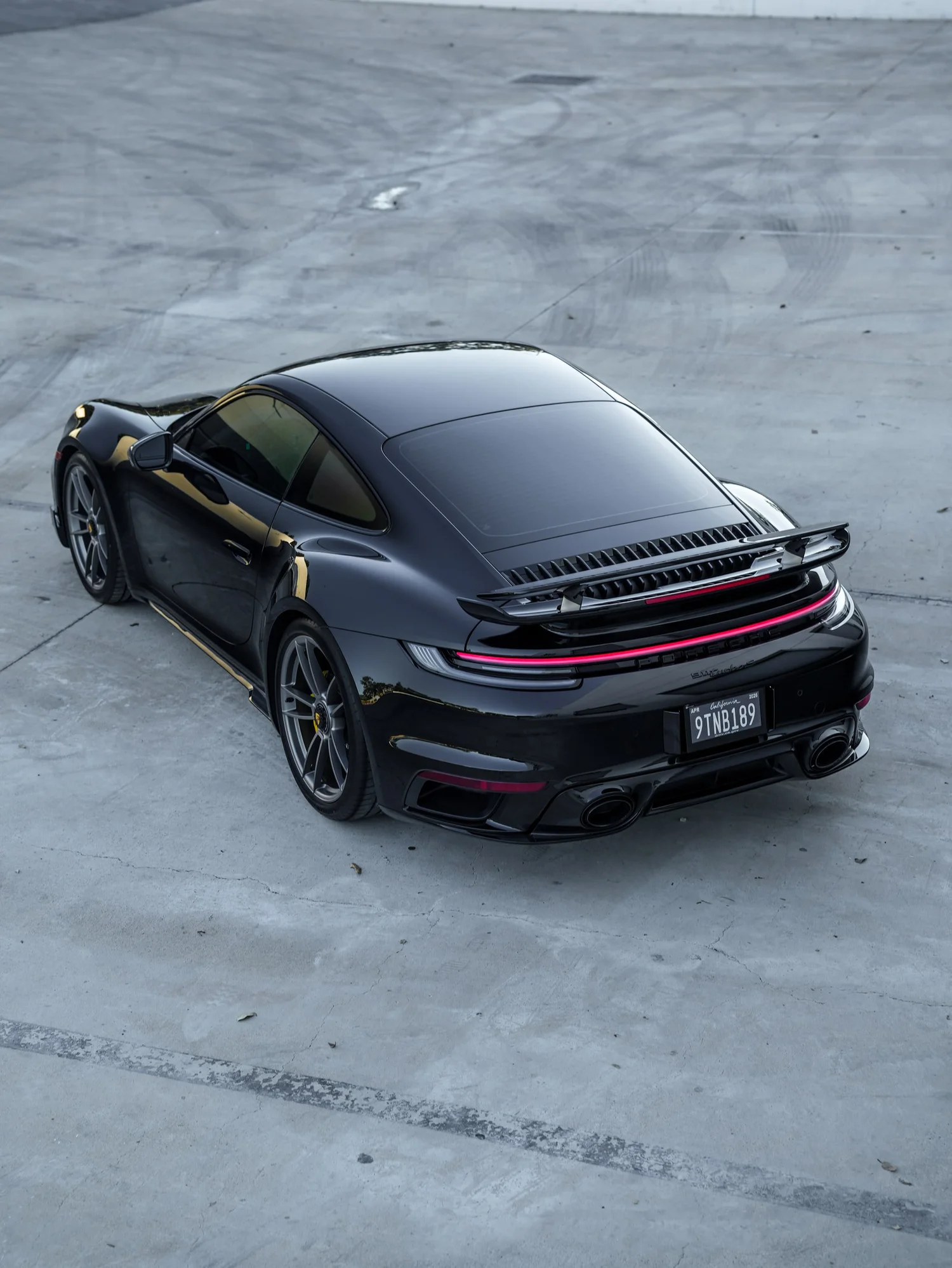 Porsche 911 Turbo S after Paint Protection Film (PPF), Window Tint and Ceramic Coating, rear-right three-quarter view