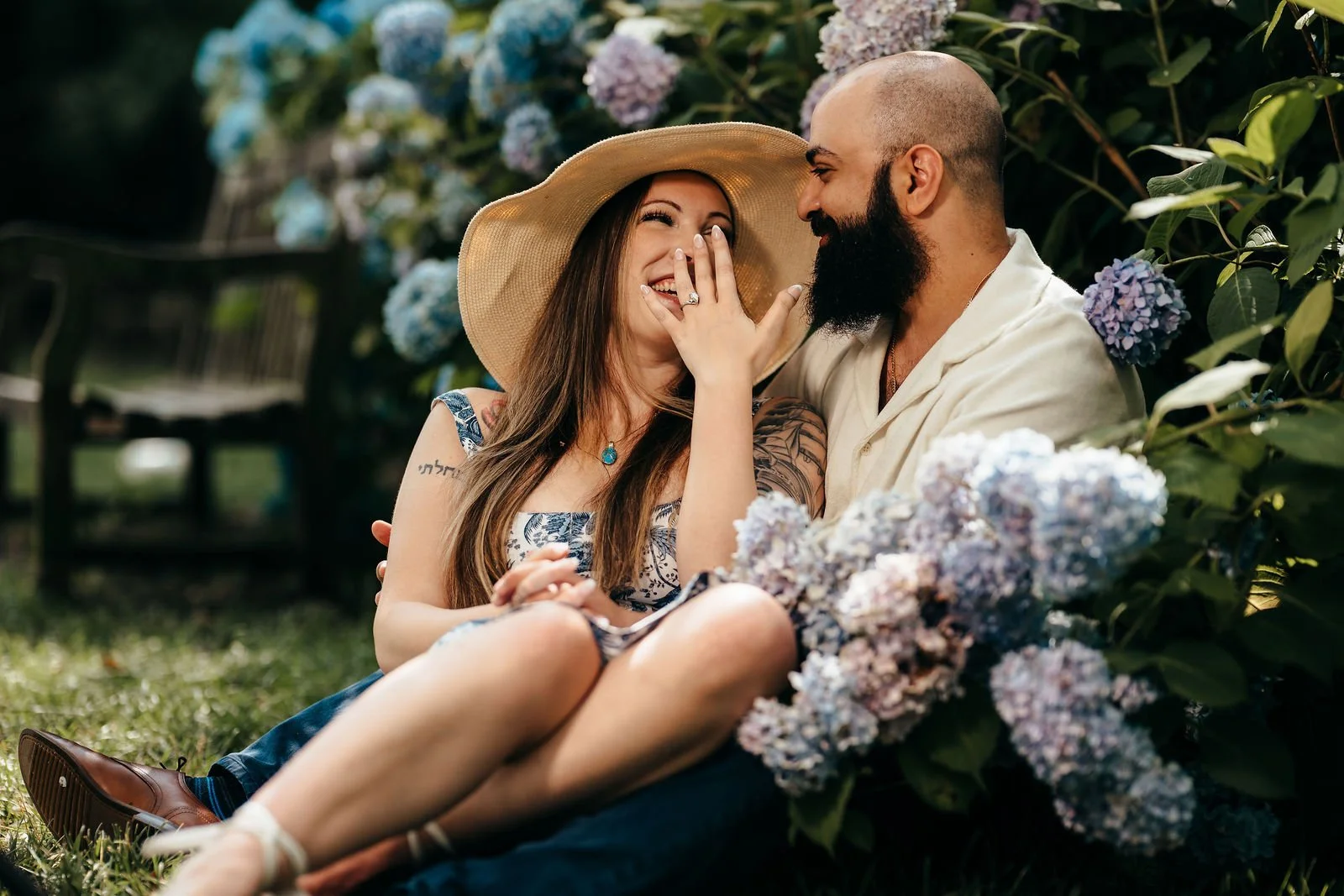 Katherine laughing among hydrangeas, Seaport Boston engagement photography