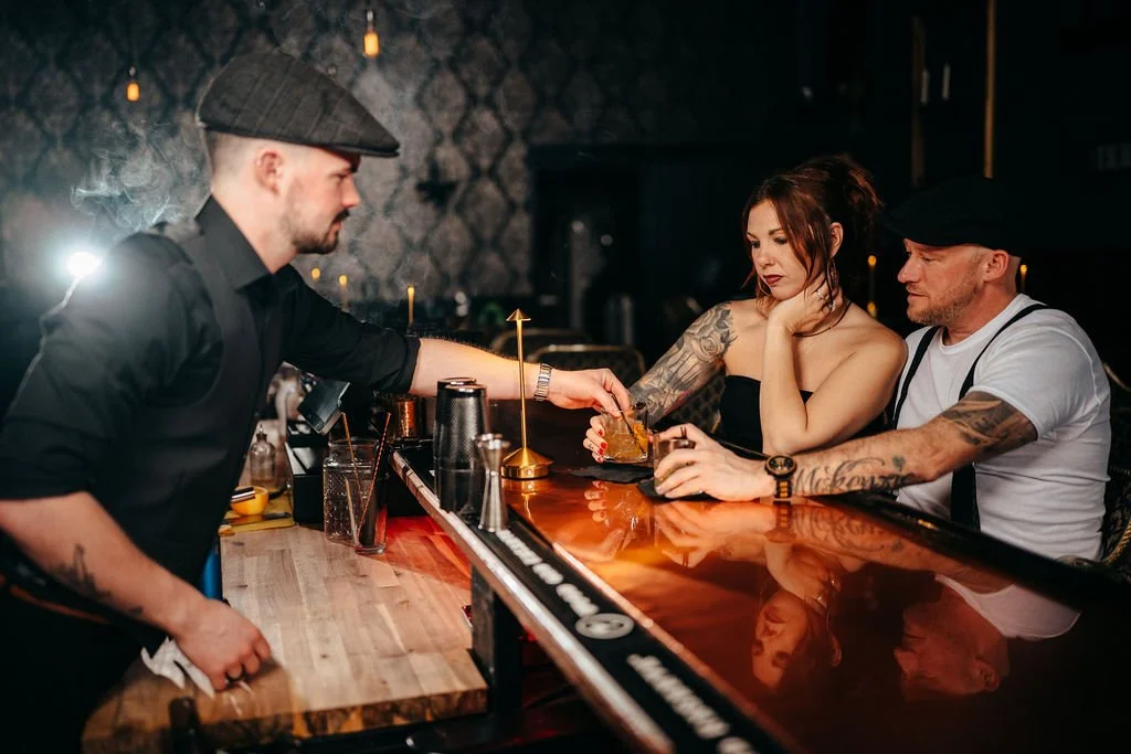 Smoky cocktails being served to Kristin and Mike at The Candy Bar in Laconia