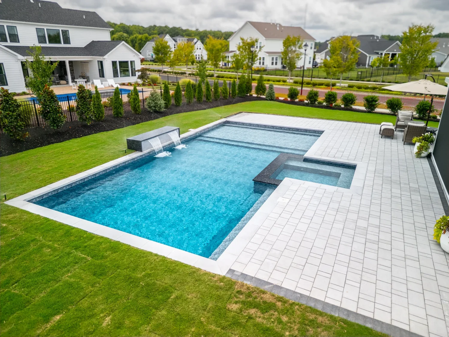 Custom pool with integrated decking and landscape