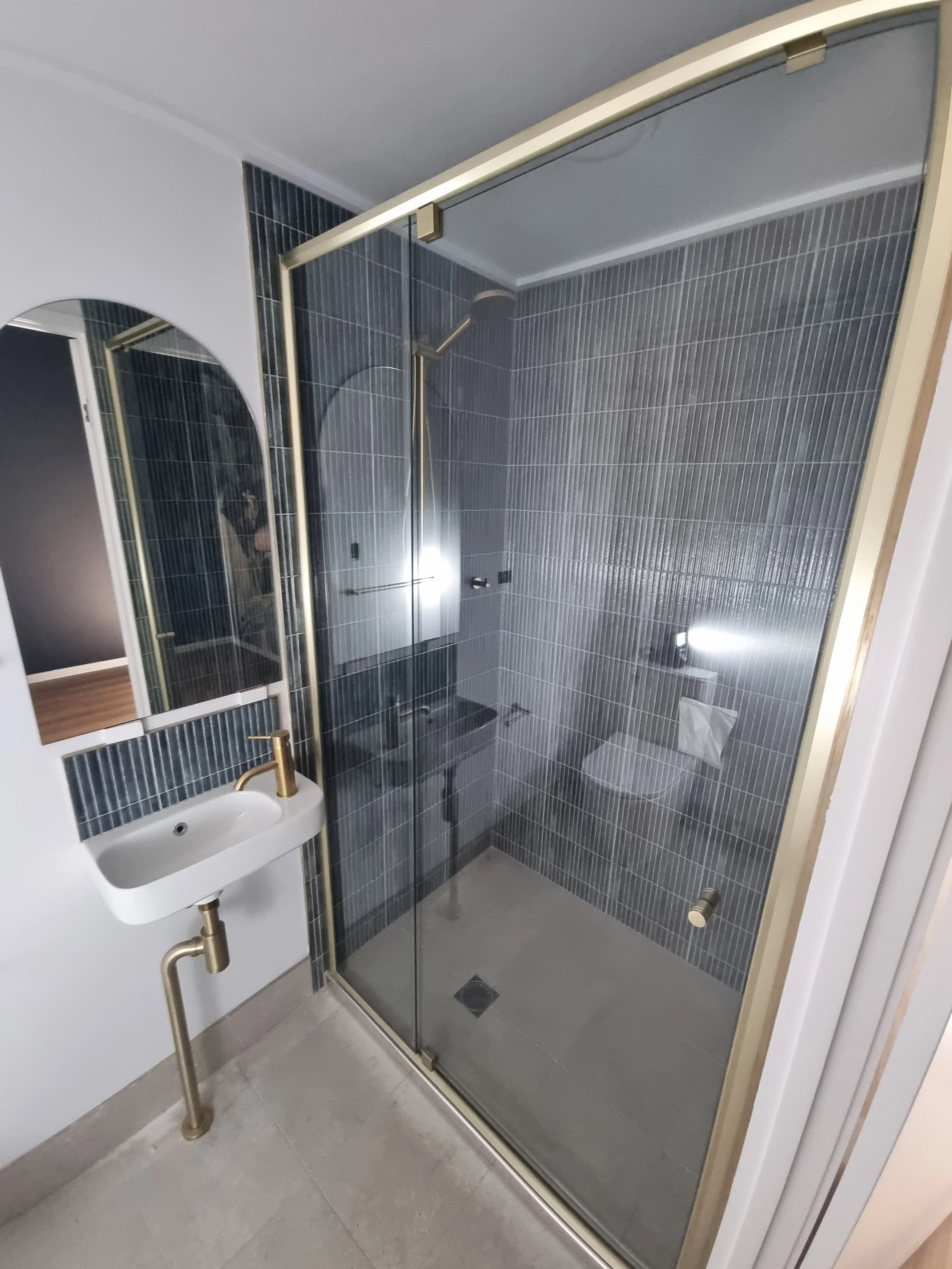 DB Glass semi-frameless shower screen installation