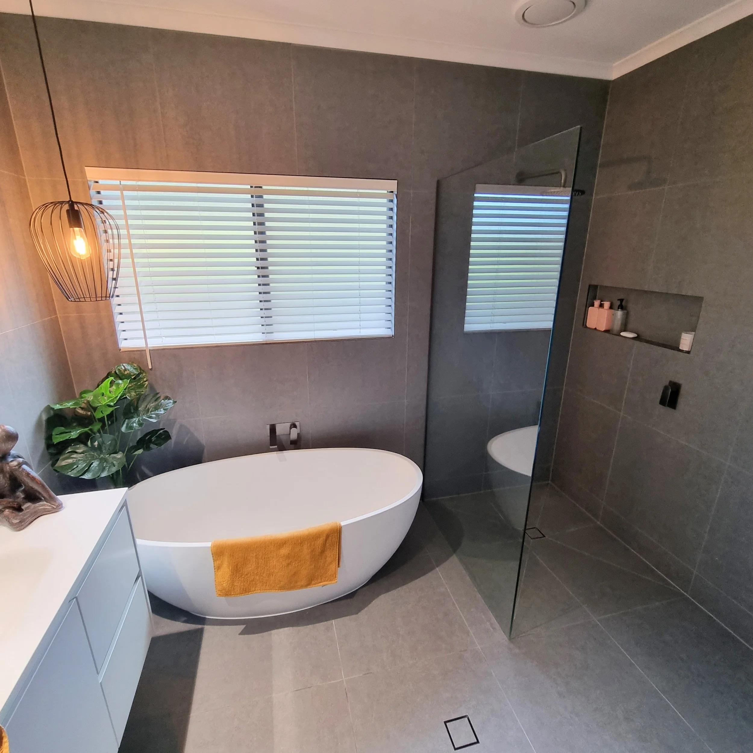 Frameless fixed panel with gunmetal hardware