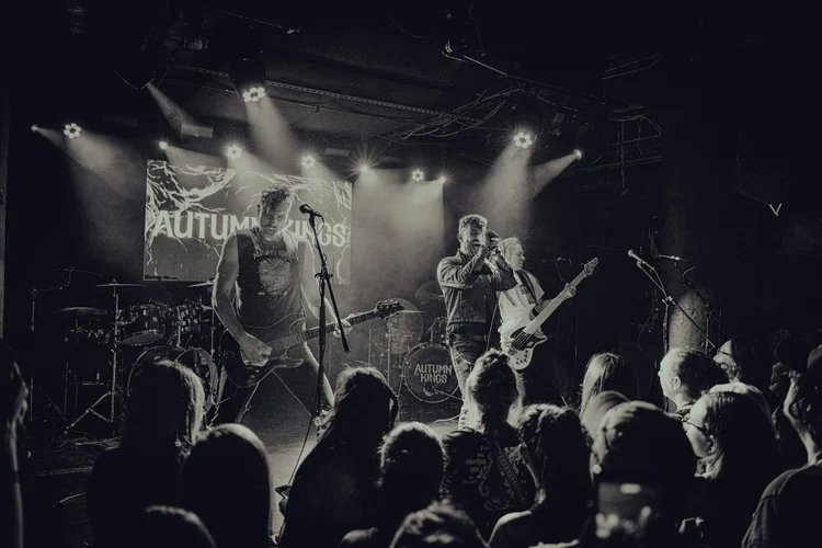 Autumn Kings performing live on stage during a concert