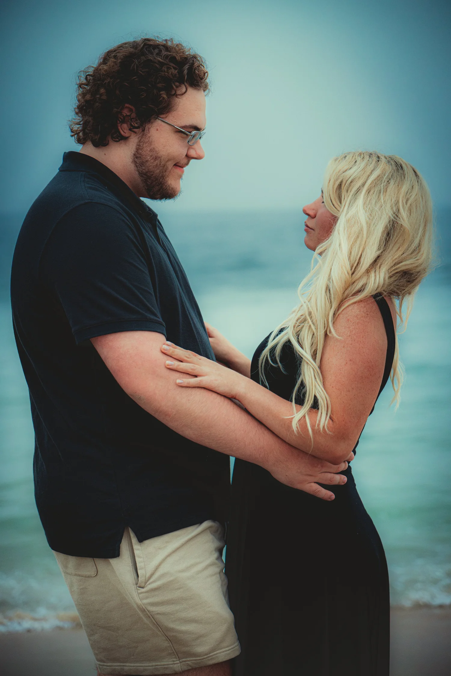 Couple photographed outdoors during a natural portrait session