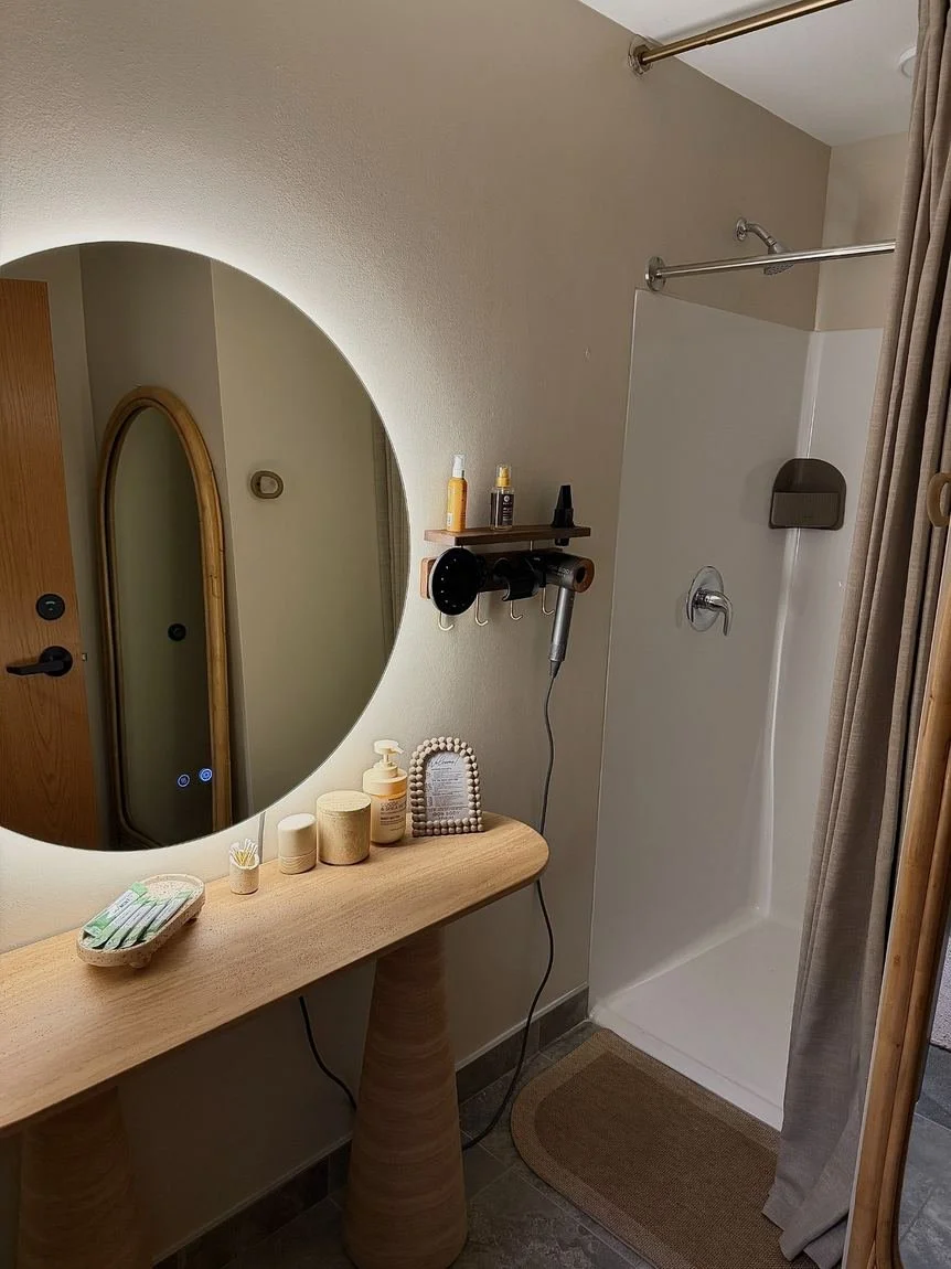 IronBody Studios private shower and wellness amenities; massage imagery forthcoming
