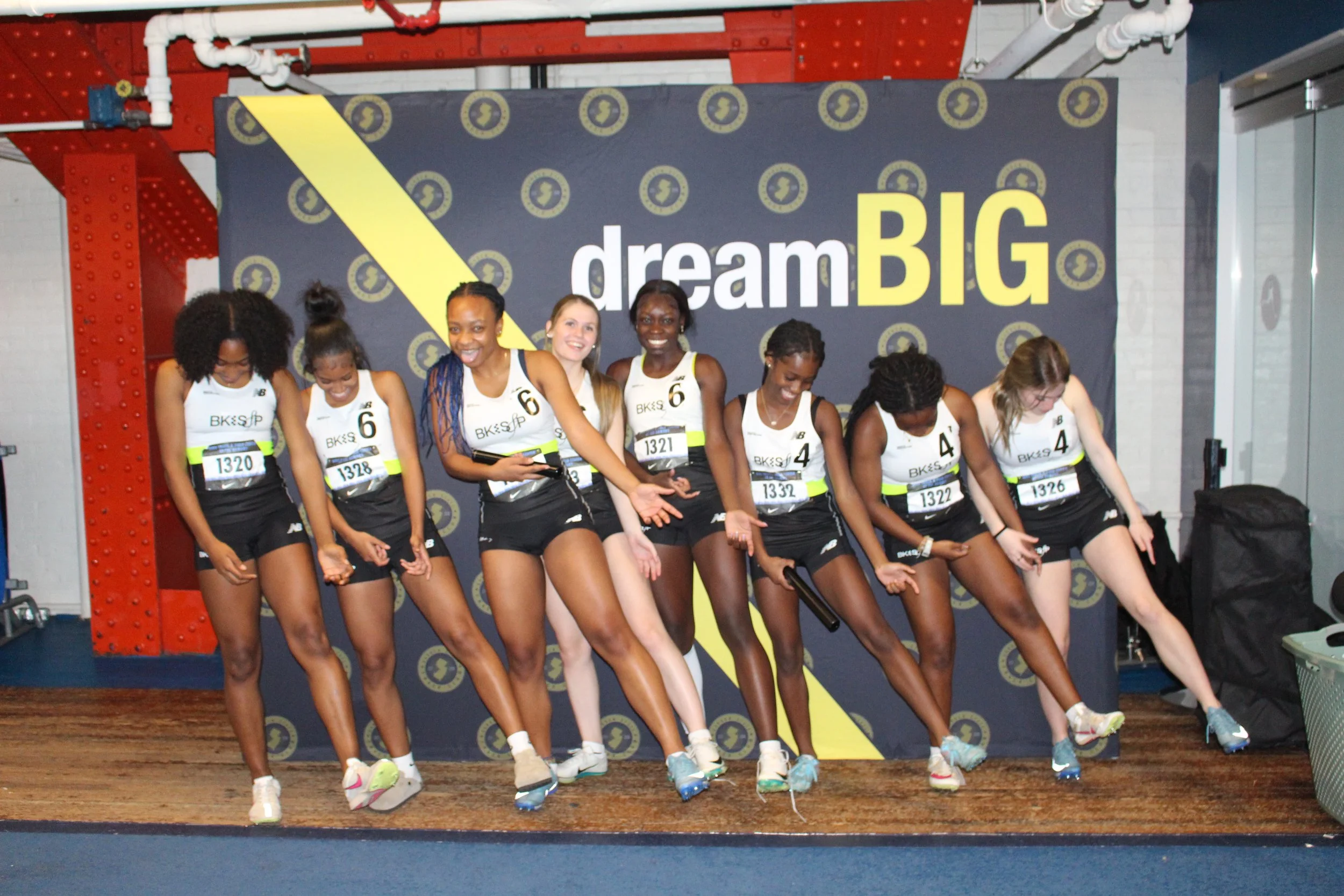 Brooklyn Speed and Power athletes racing at an indoor track meet