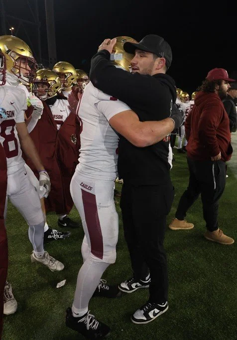 Dom Clegg being thanked by an athlete after coaching