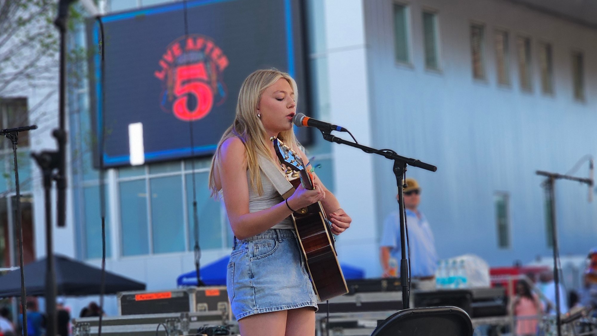 A BR Music Studios student performing on the Live After 5 stage in downtown Baton Rouge
