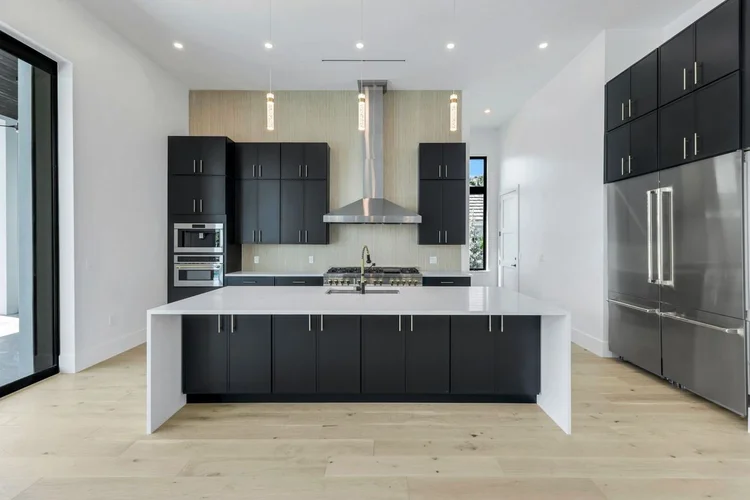 The kitchen, open to the great room.