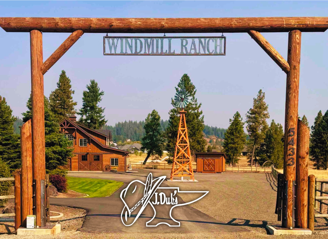 Hanging mount ranch sign between two posts