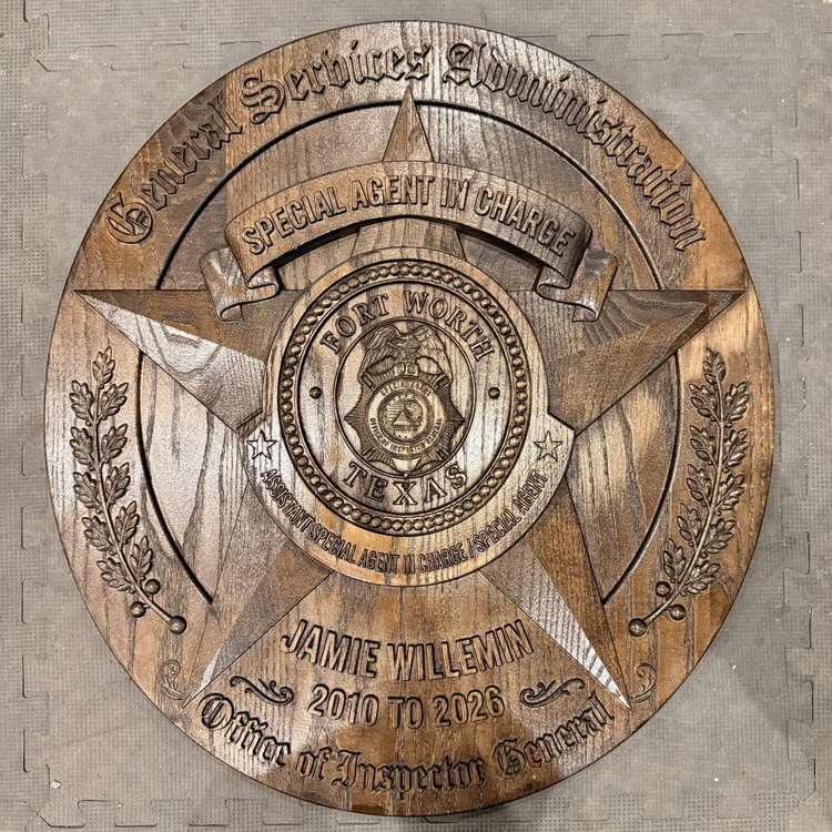 Finished General Services Administration Office of Inspector General custom wood plaque with a carved badge, Texas star, personalized name and service dates