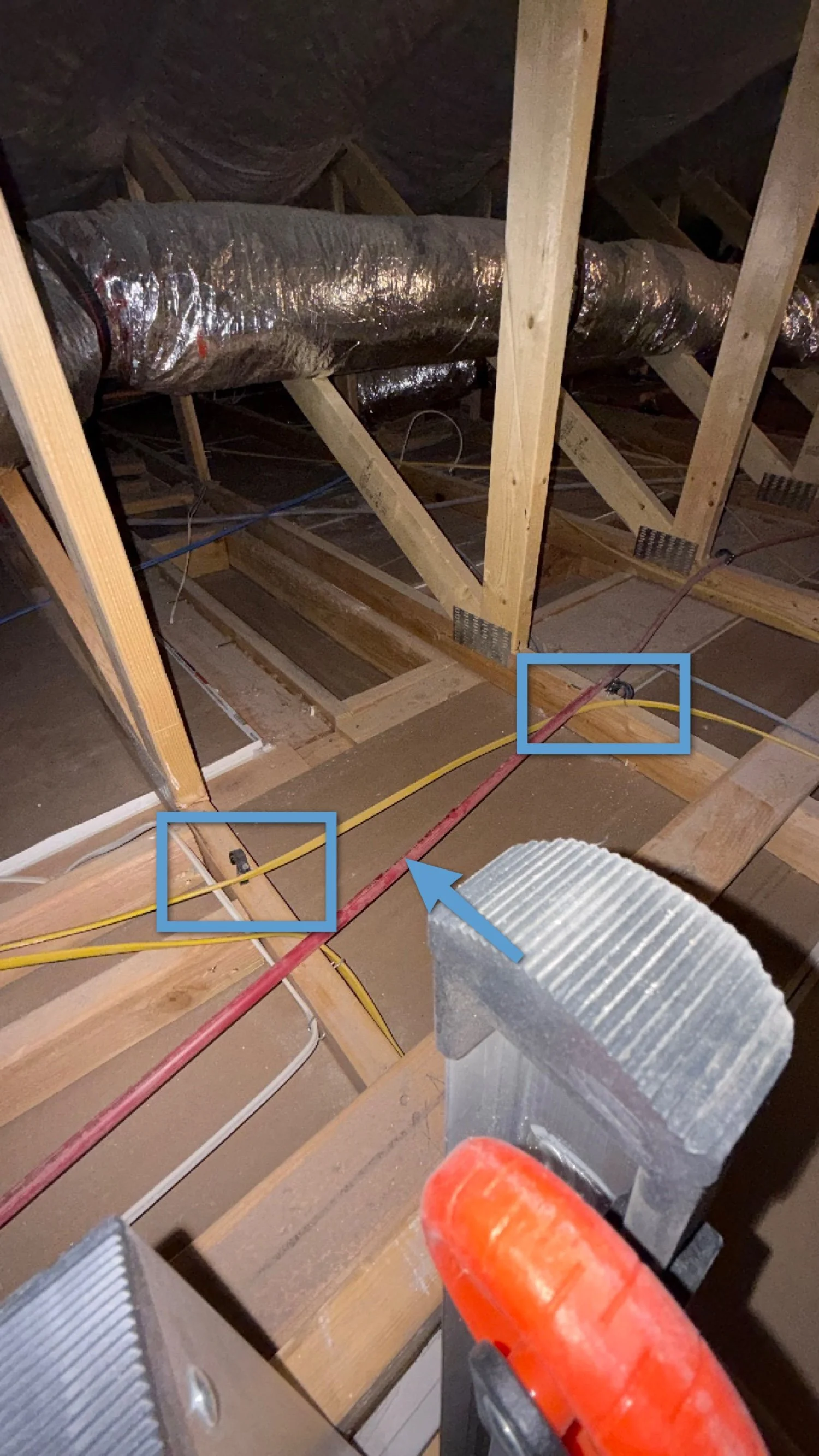 Unsecured water supply lines in an attic near insulation and ductwork