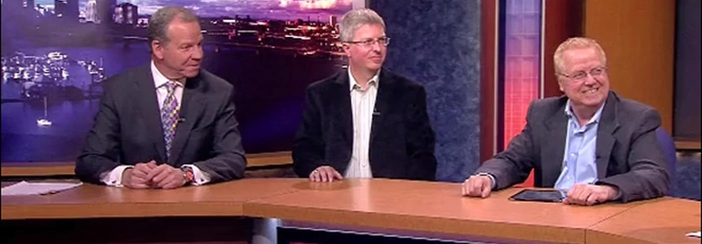 Dave Tragethon on set at a Portland TV news desk