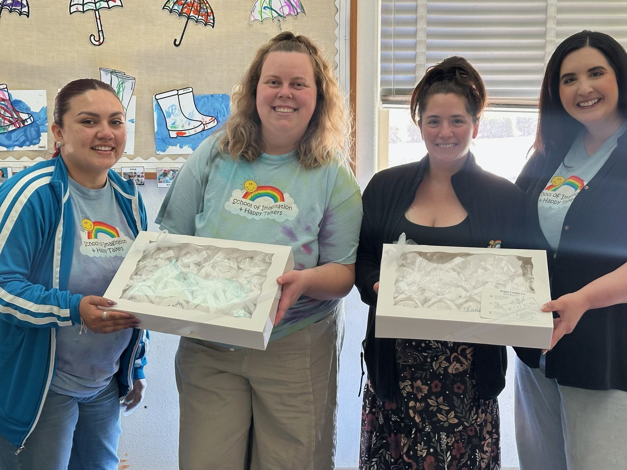 SOI team members with Nicole Rose custom cookies