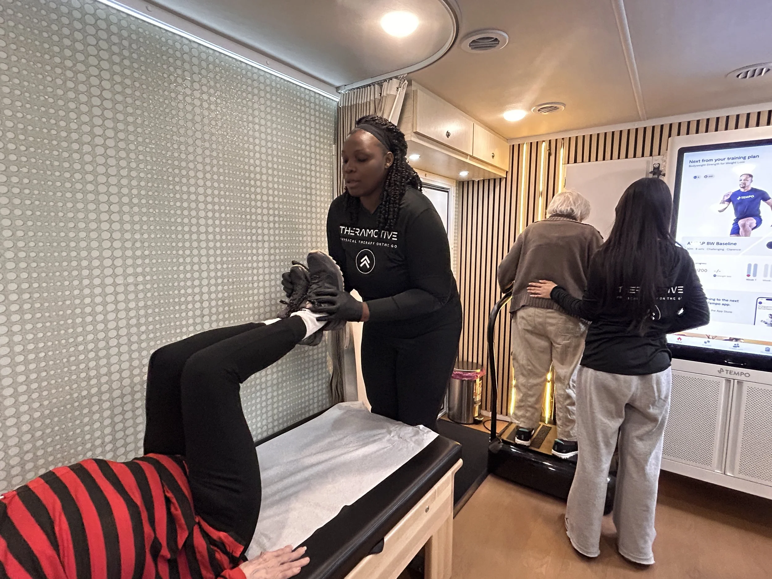 Physical therapist treating patient