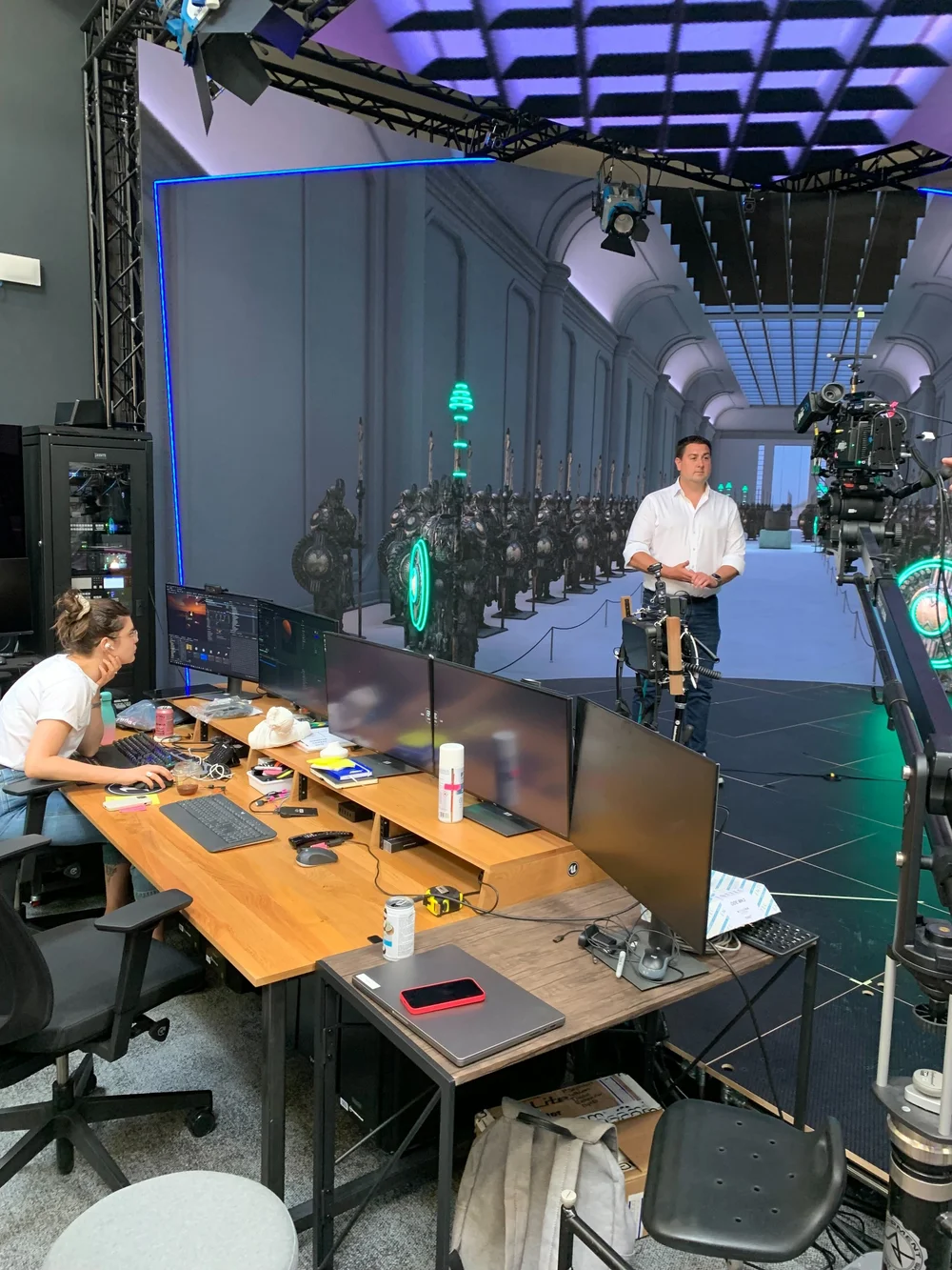 Karl Nicholson in a virtual-production studio with cameras, crew and a digital backdrop
