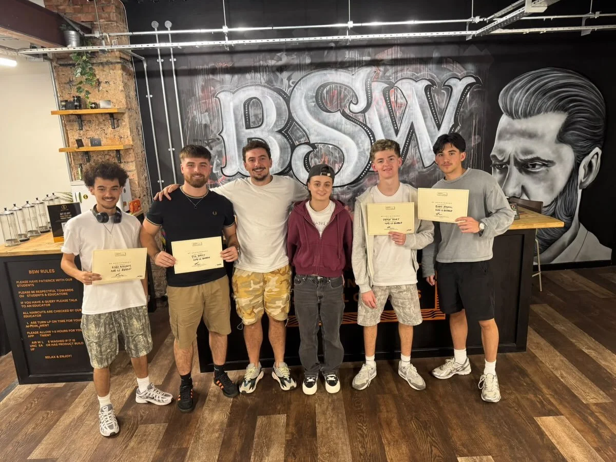 BSW graduates and educators celebrating with certificates, from Josh Tovey’s September 2026 graduation post