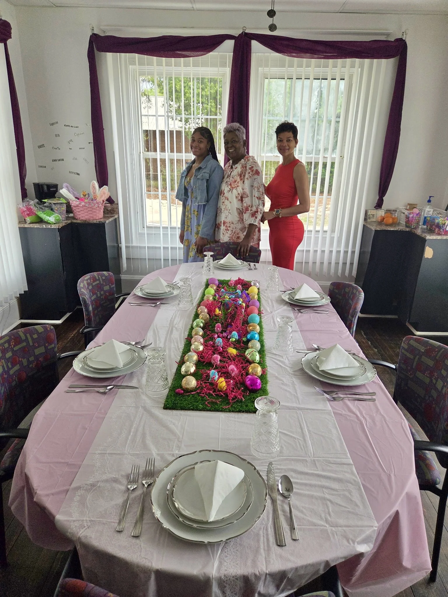 Jazz standing beside the mantle display she arranged