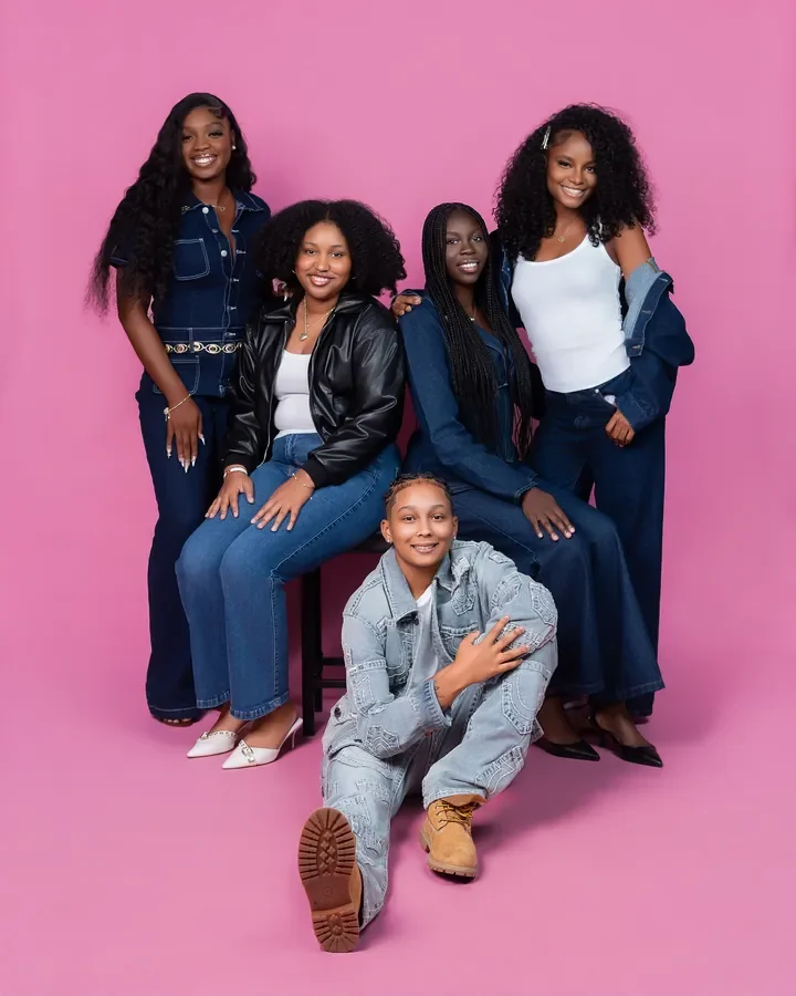 Group portrait on a pink studio backdrop — Smooth Studios