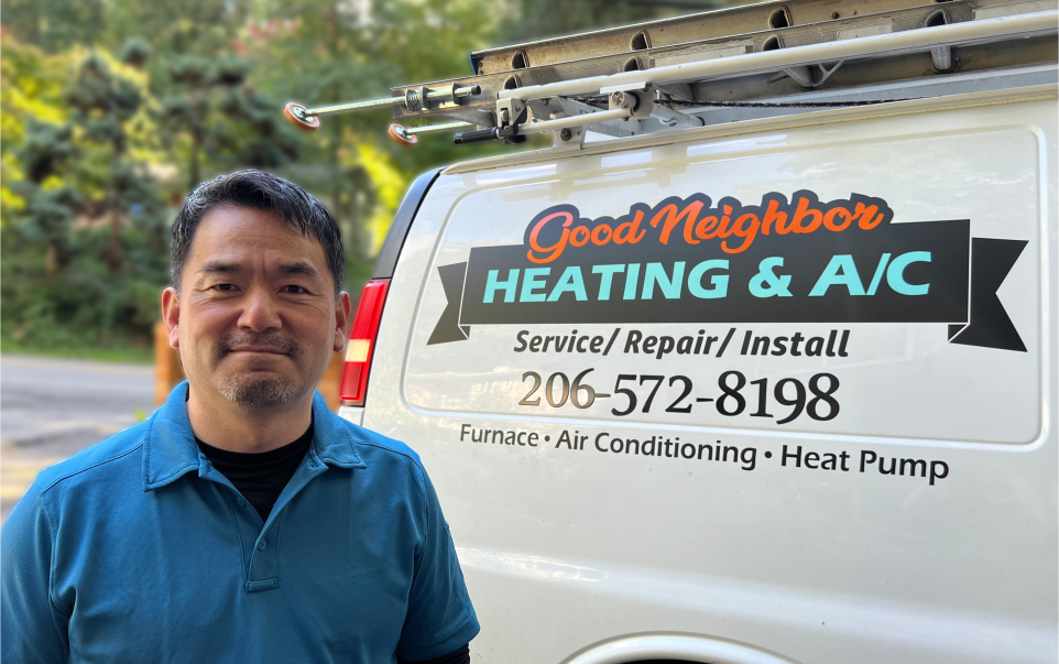 Business owner standing infront of work van